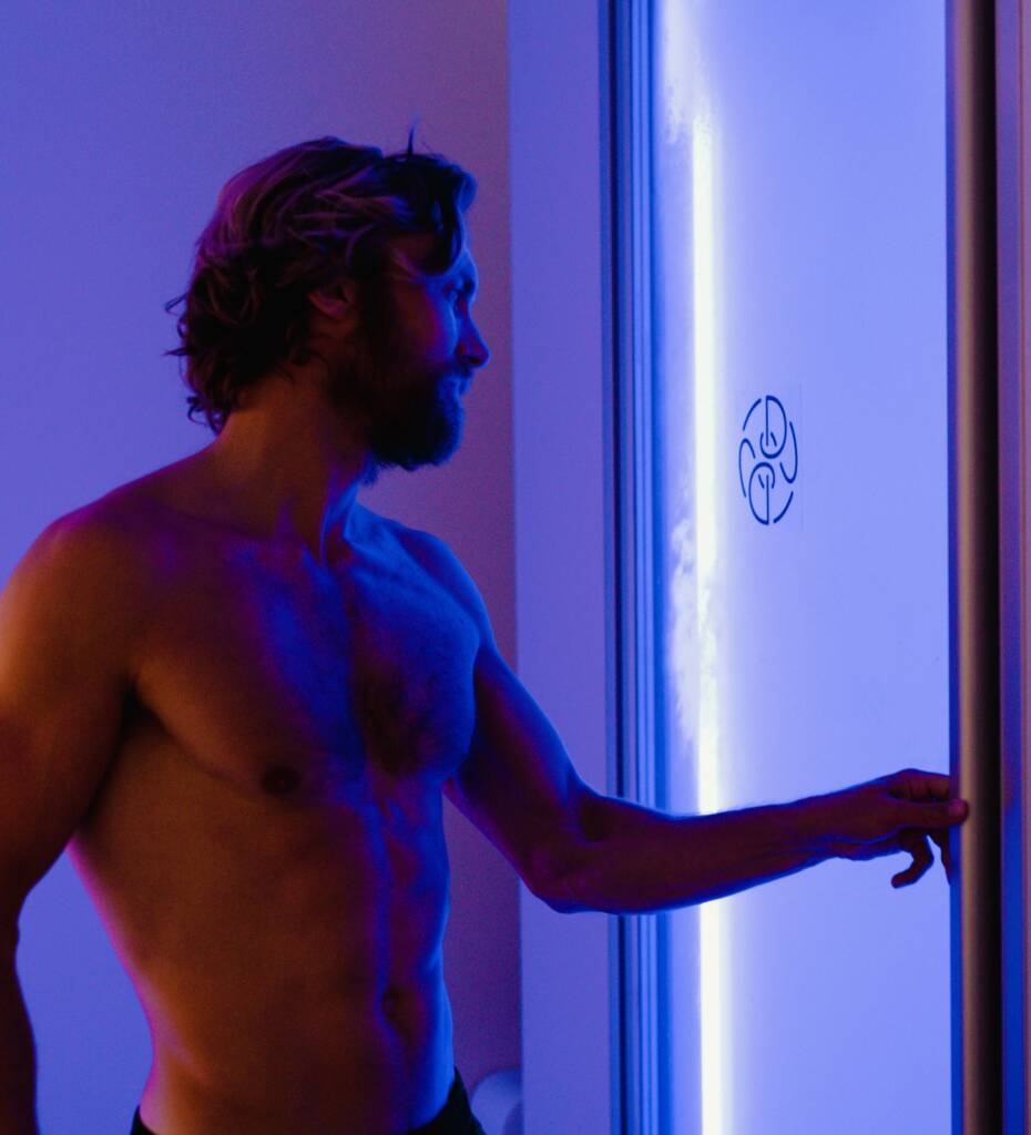 man entering cryotherapy chamber