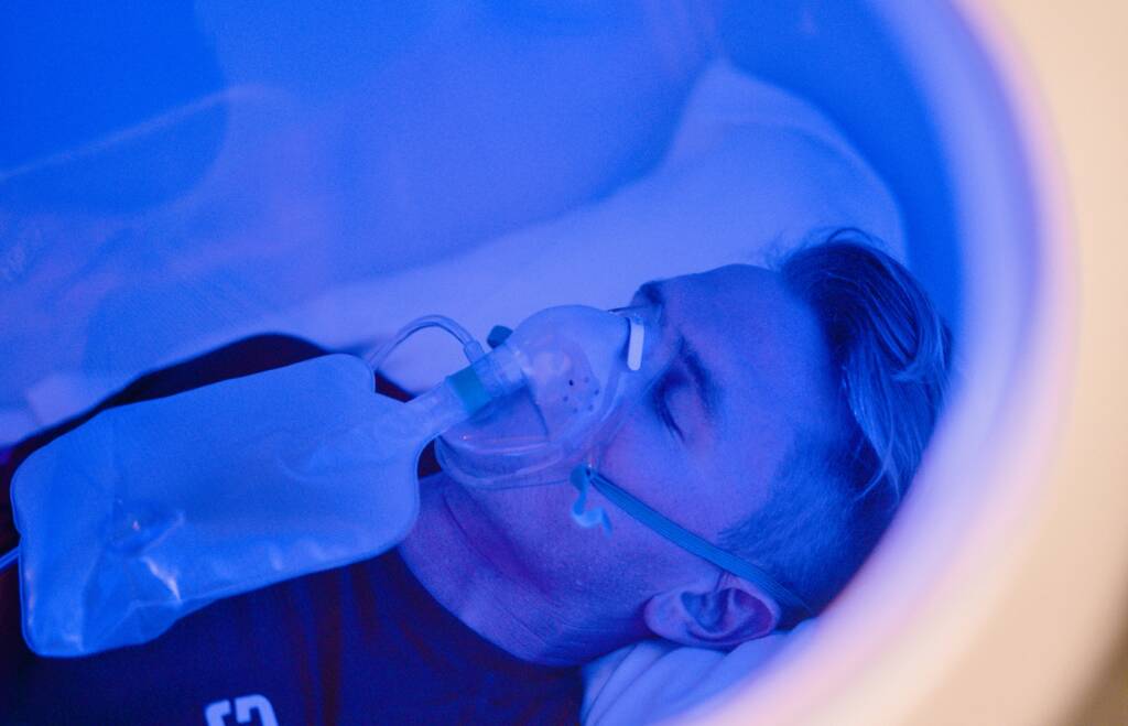 longevity clinic treatment man with an oxygen mask on